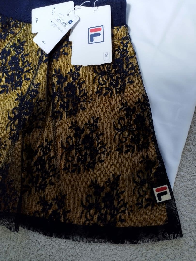 大人可愛い　L新品　FILAフィラ テニス・バドミントンウェア スコート レース