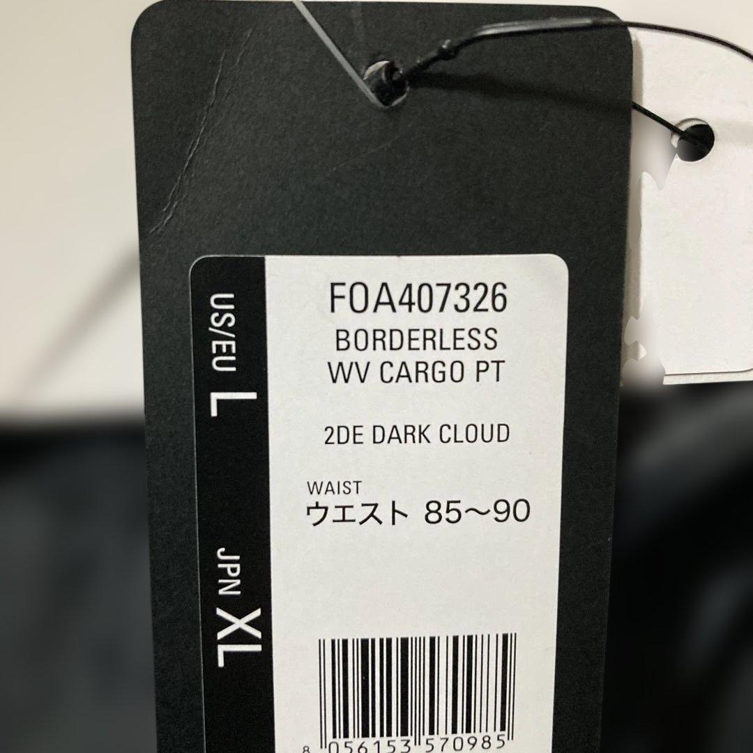 新品未使用タグ付きOAKLEYマットチャコールグレーピステウィンドブレーカーXL