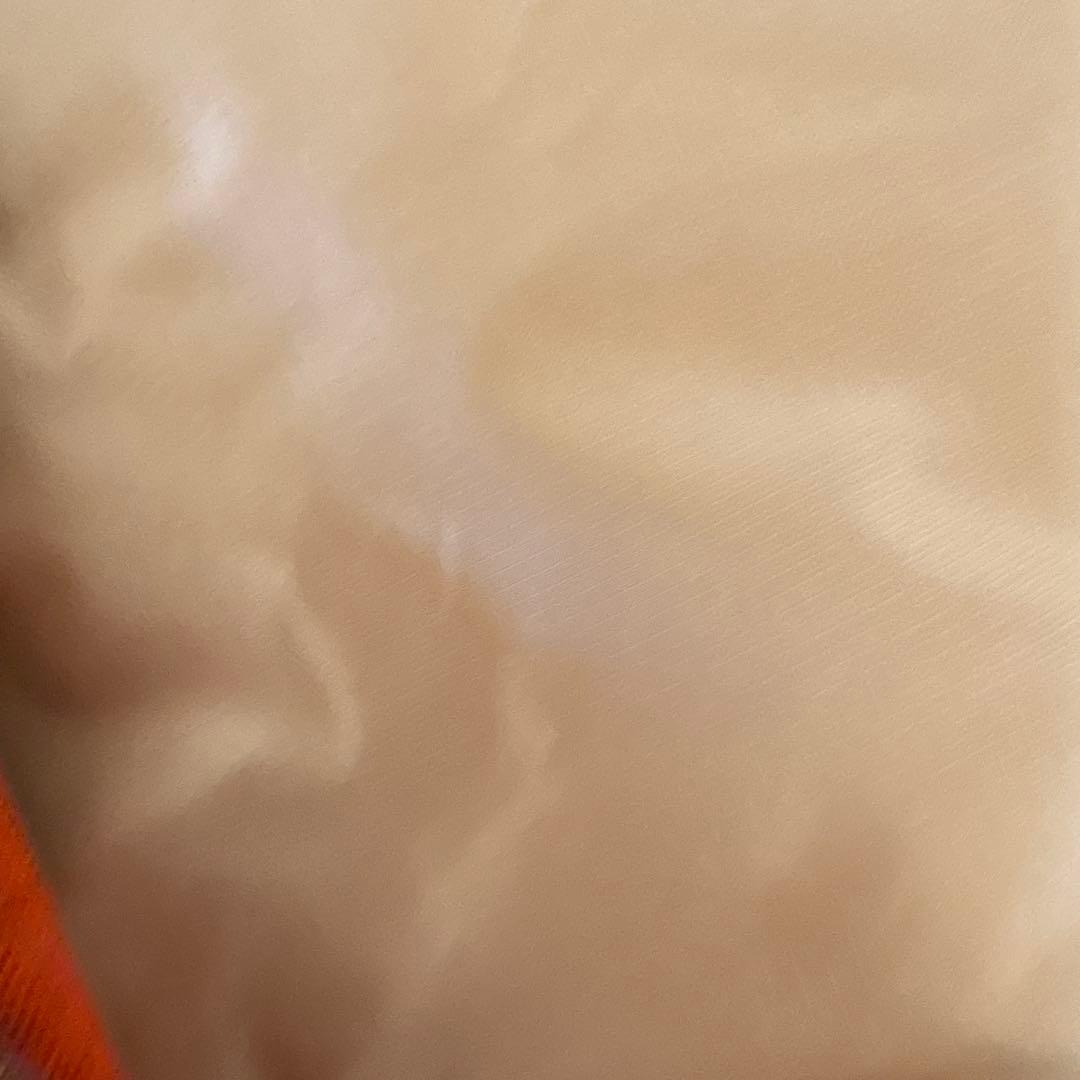 【新品未使用】✨エイココンドウ✨黒とグレー混合地にオレンジやの柄のトップス❣️