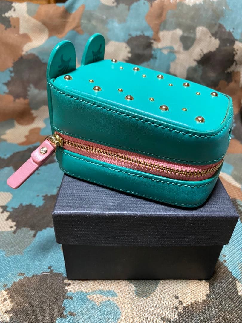 ターコイズ色の耳付きアクセサリーケース