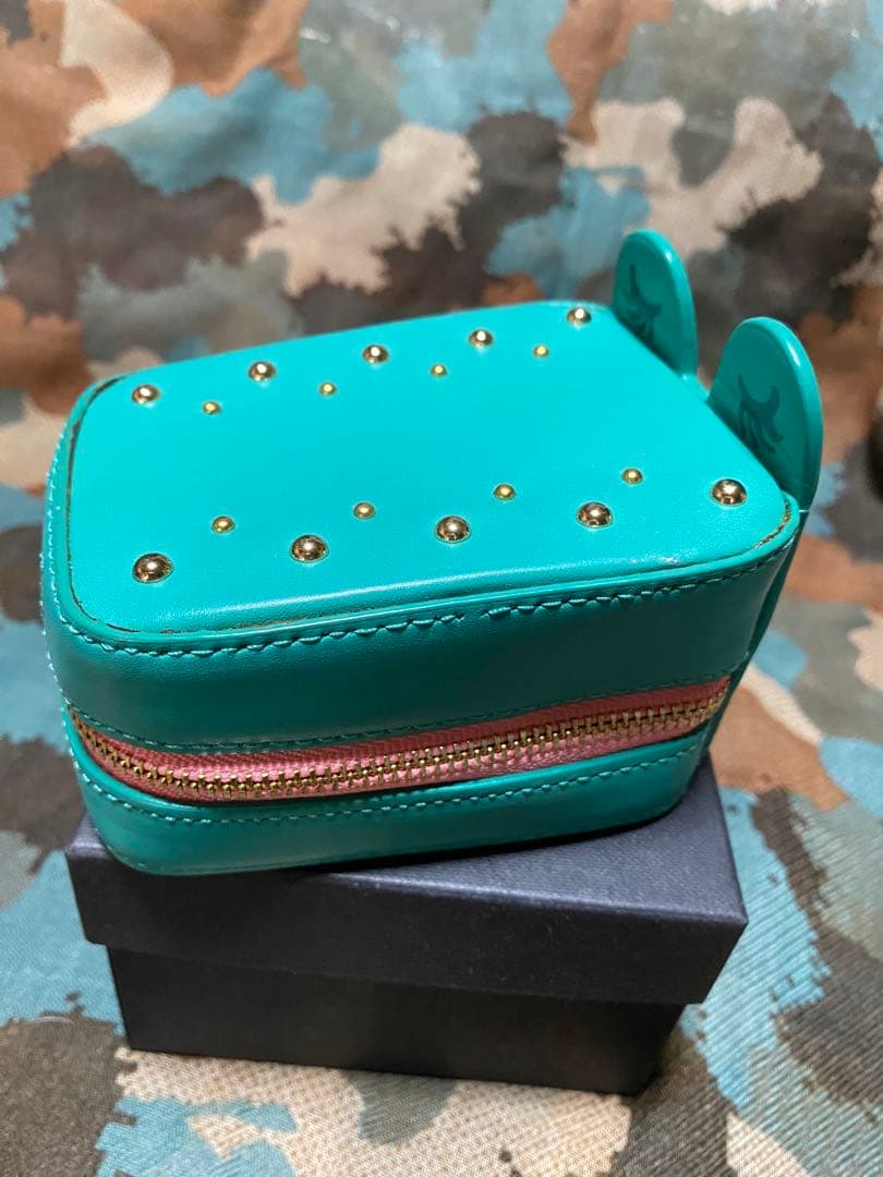 ターコイズ色の耳付きアクセサリーケース