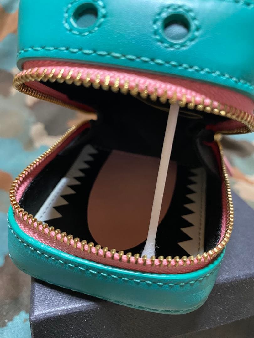 ターコイズ色の耳付きアクセサリーケース