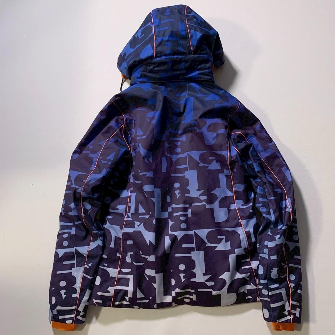 【高機能】デサント スキージャケット モーション3D ヒートナビ 総柄 青 M