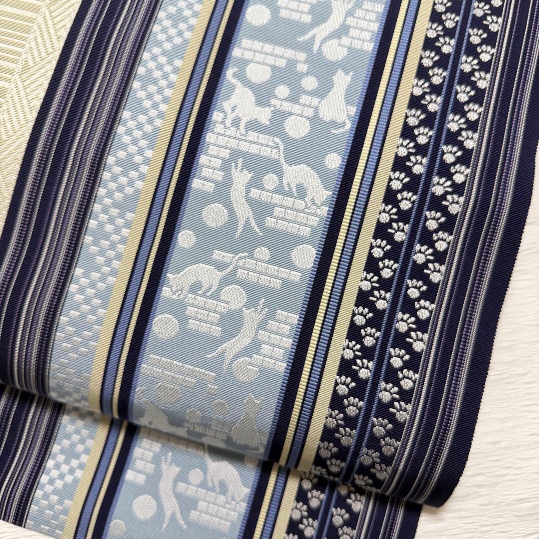 m-45 本場筑前博多織 黒木織物 猫 足跡 名古屋帯 正絹 未使用極美品