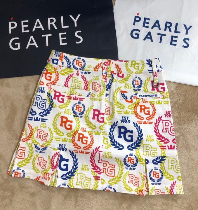 パーリーゲイツグログランカラフルローリエプリントペプラムプリーツスカートサイズ0