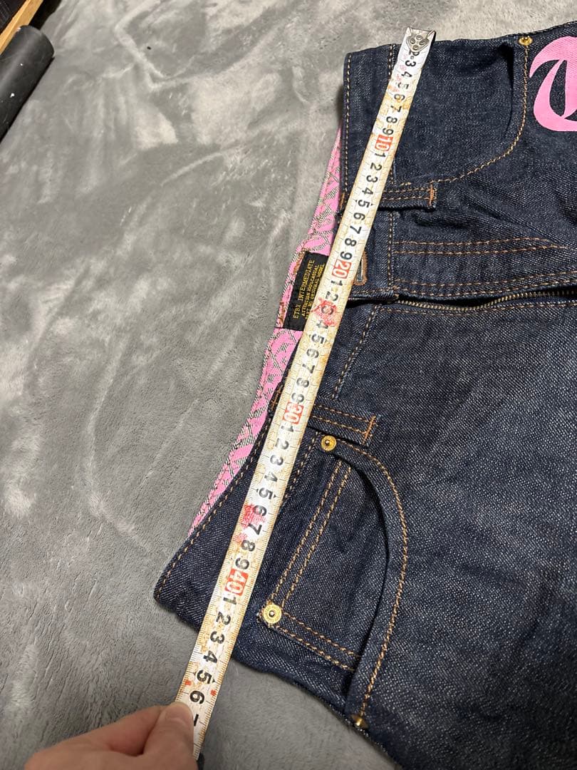 ピンクロゴデニムパンツ　エビス　ペイントパンツ 腰履き　ストリート