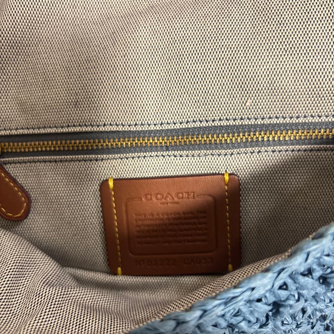 COACH チェリー柄ストロー素材ハンドバッグ