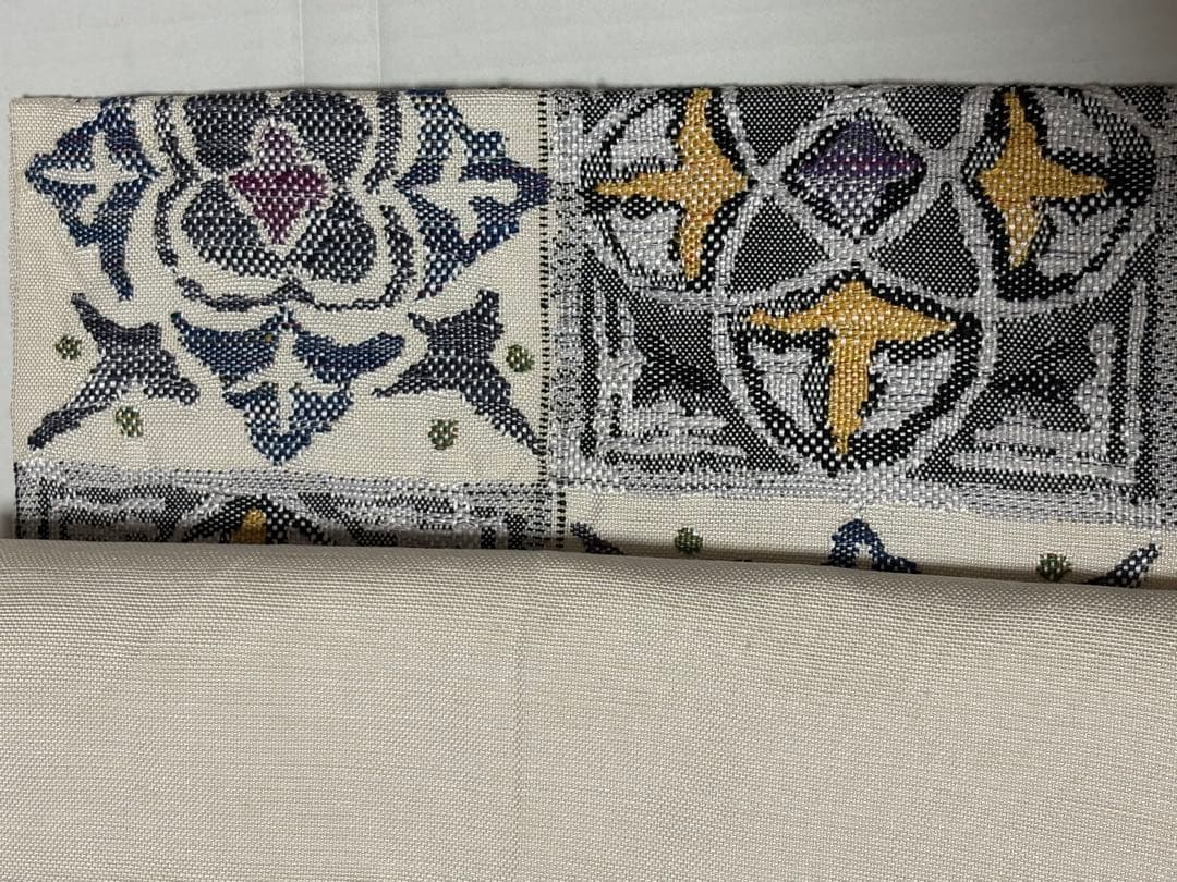 帯屋捨松　白の紬幾何学模様　八寸帯　単にも！