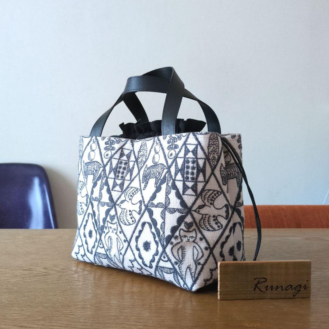 あおりポケットの巾着バッグ＊ミナペルホネン Symphony