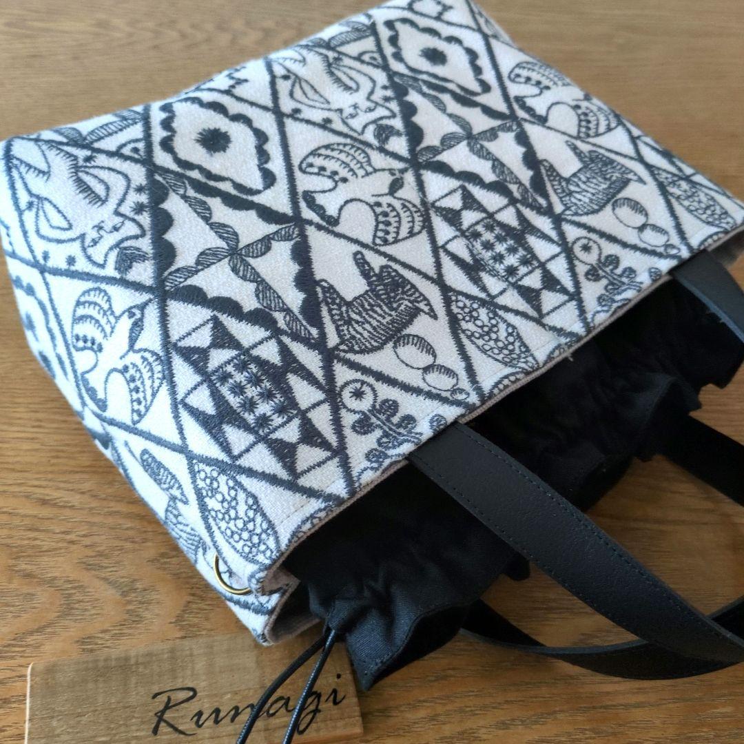 あおりポケットの巾着バッグ＊ミナペルホネン Symphony