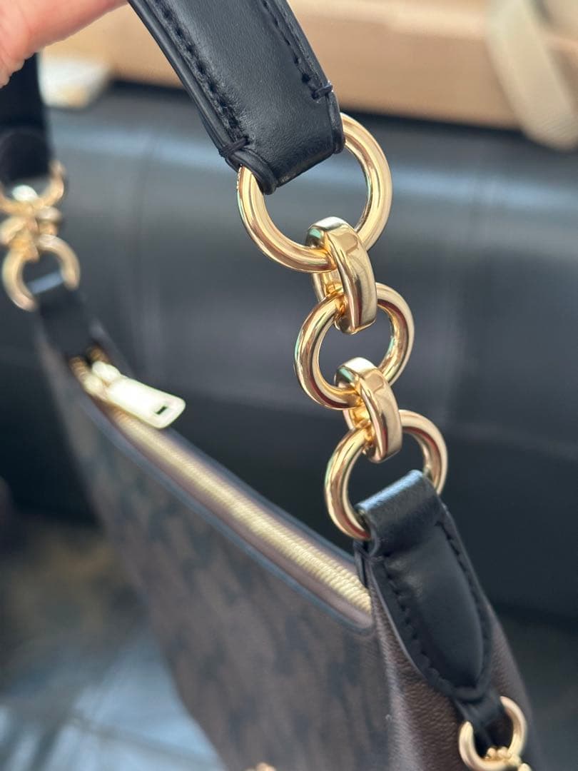 COACH ロゴ入りブラウンバッグ