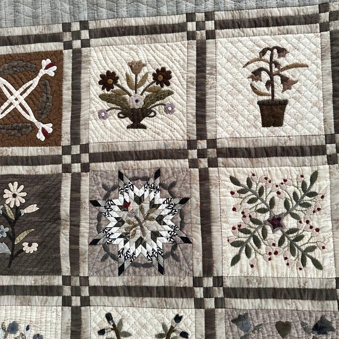 ハンドメイドパッチワークキルトのタペストリー