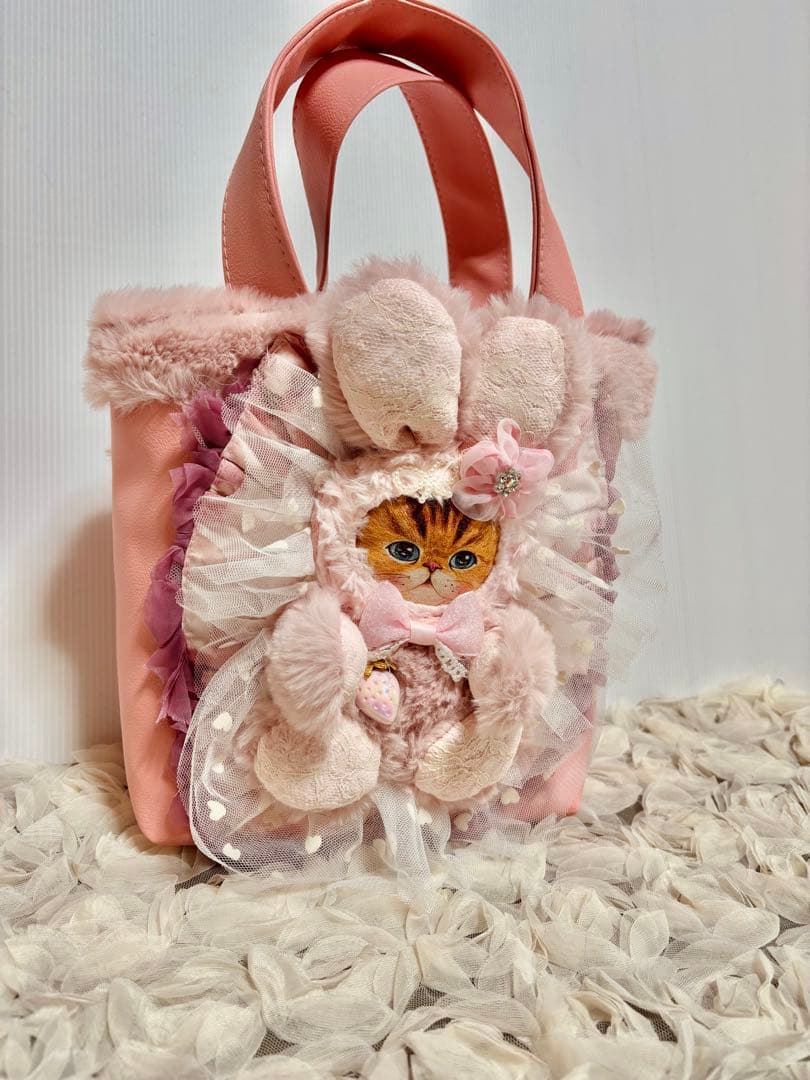 コヤンイサムチョン　フェイクレザーピンクのトートバッグ