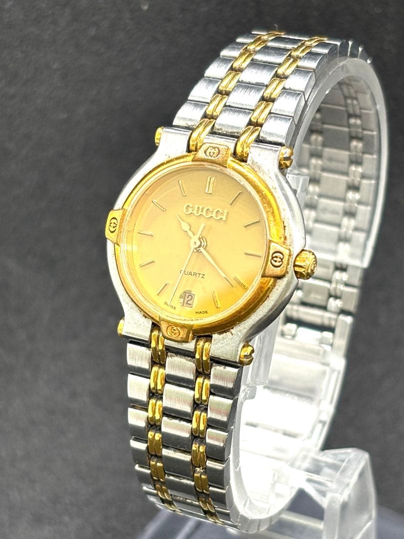 GUCCI 9000Lラウンドデイトゴールド文字盤 QZレディース腕時計 不動