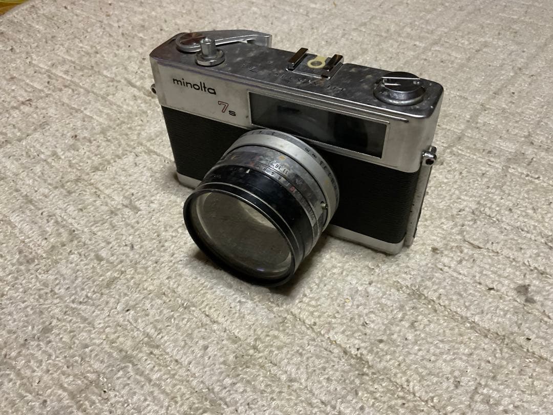 ミノルタ・7S。フイルムカメラ。【中古品　現状　カメラカバーなし　昭和レトロ】。