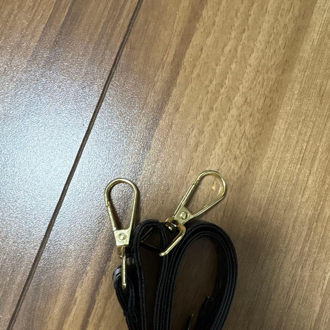 オールオーバーエンボスロゴ ミニハンドバッグ（グレイン）（EC限定カラー）