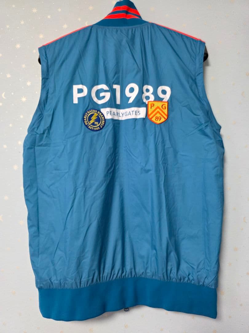 美品パーリーゲイツ蓄熱・防風・撥水中綿リバーシブルジャケット４