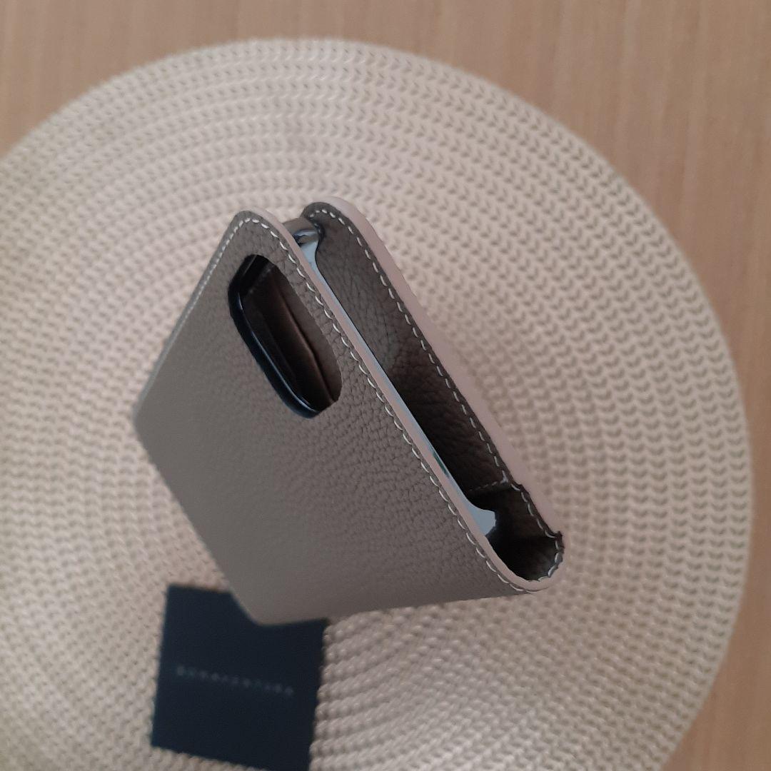 ボナベンチュラiPhone14Plusダイアリーケース　エトープ　シュリンクレザ