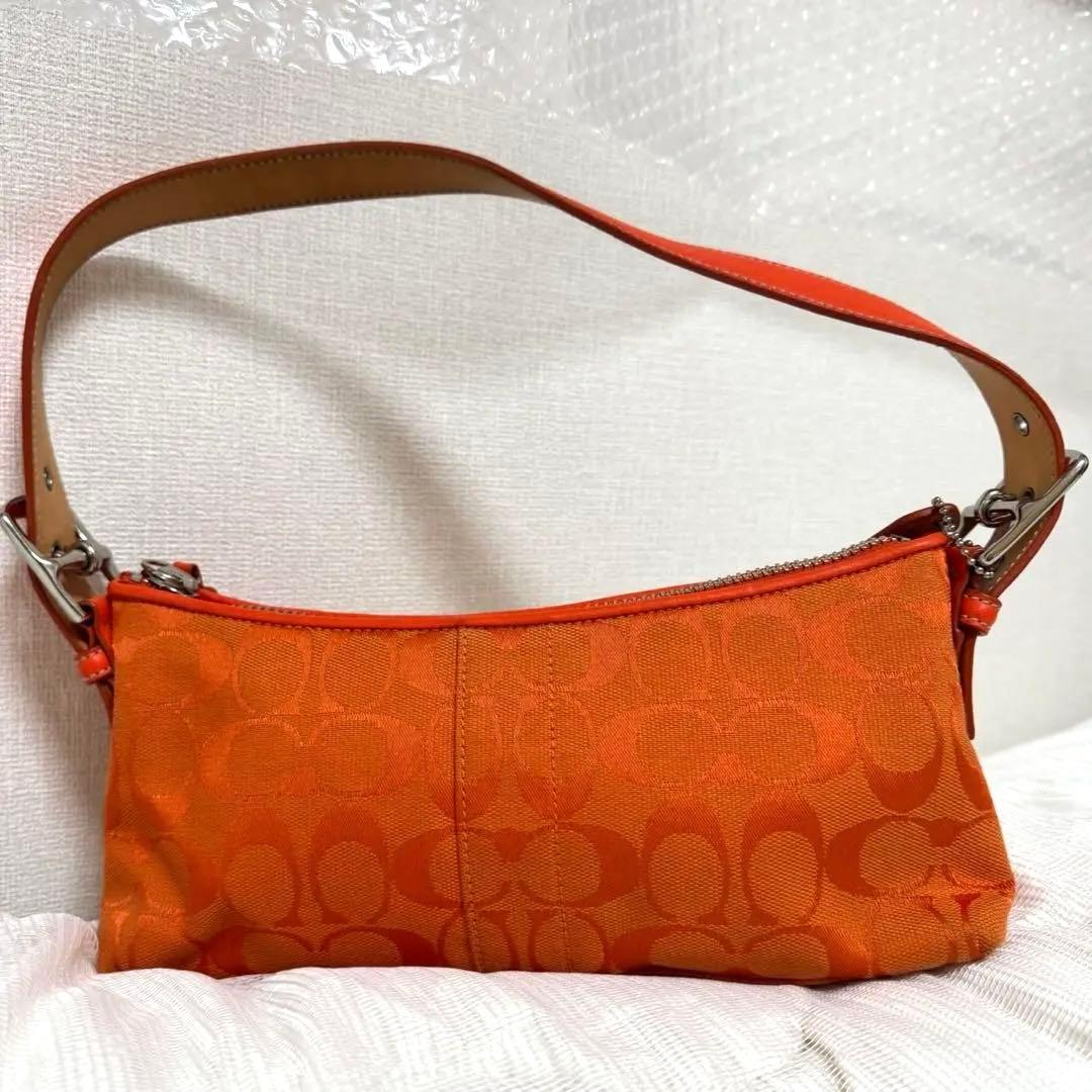 COACH アクセサリーポーチ　ワンショルダー　シグネチャー　オレンジ