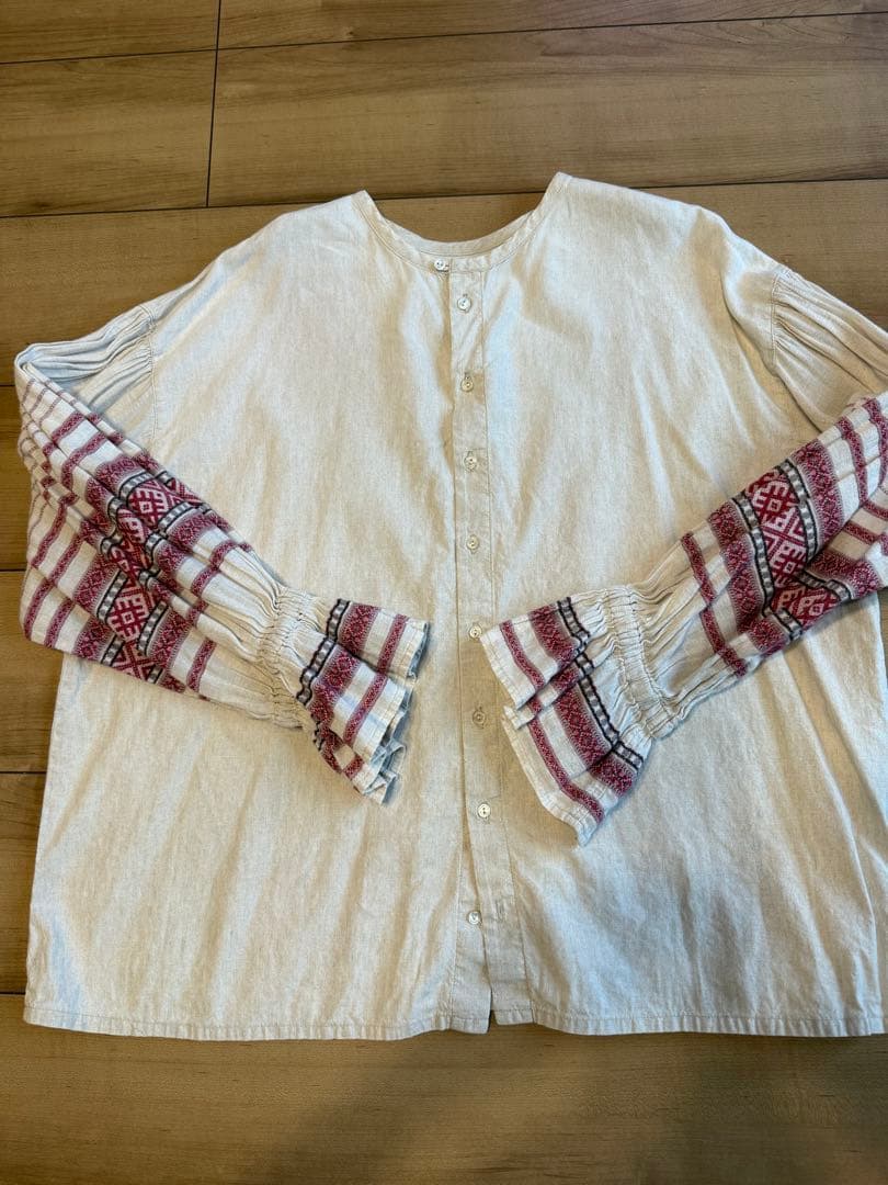 nest Robe（ネストローブ）フリル付き長袖シャツ