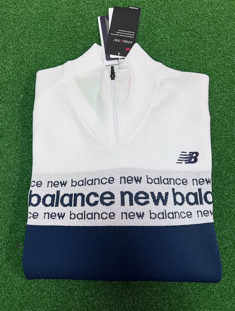 NewBalance ロゴライン軽量ハーフジップ スタンド ニット プルオーバー