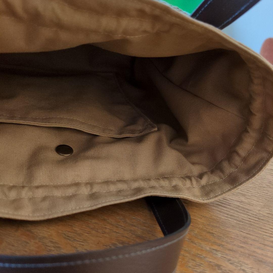 あおりポケットの巾着バッグ＊ミナペルホネン