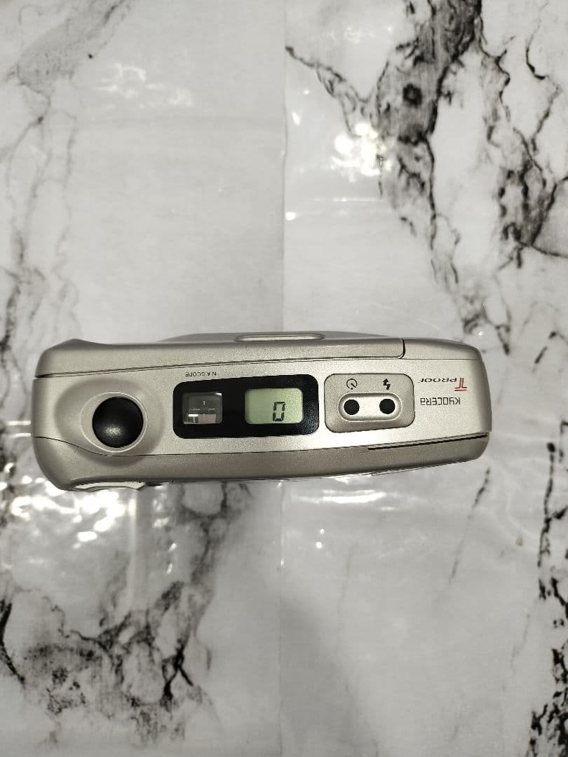 キョウセラ　KYOCERA T PROOF F3.5