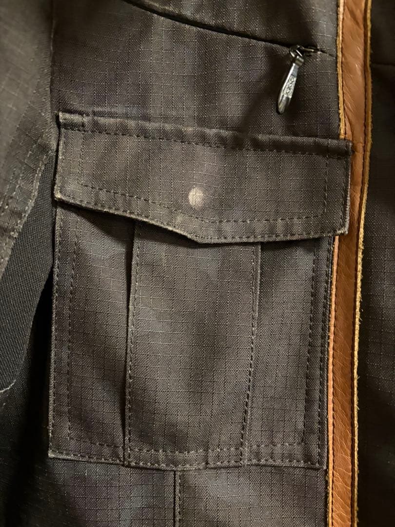 クシタニ フィンジャケット ブラックカモフラ/L