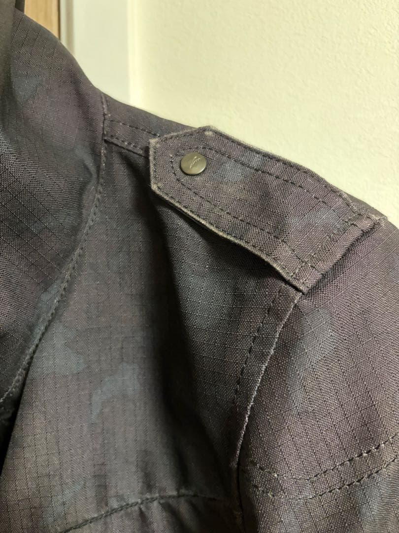 クシタニ フィンジャケット ブラックカモフラ/L