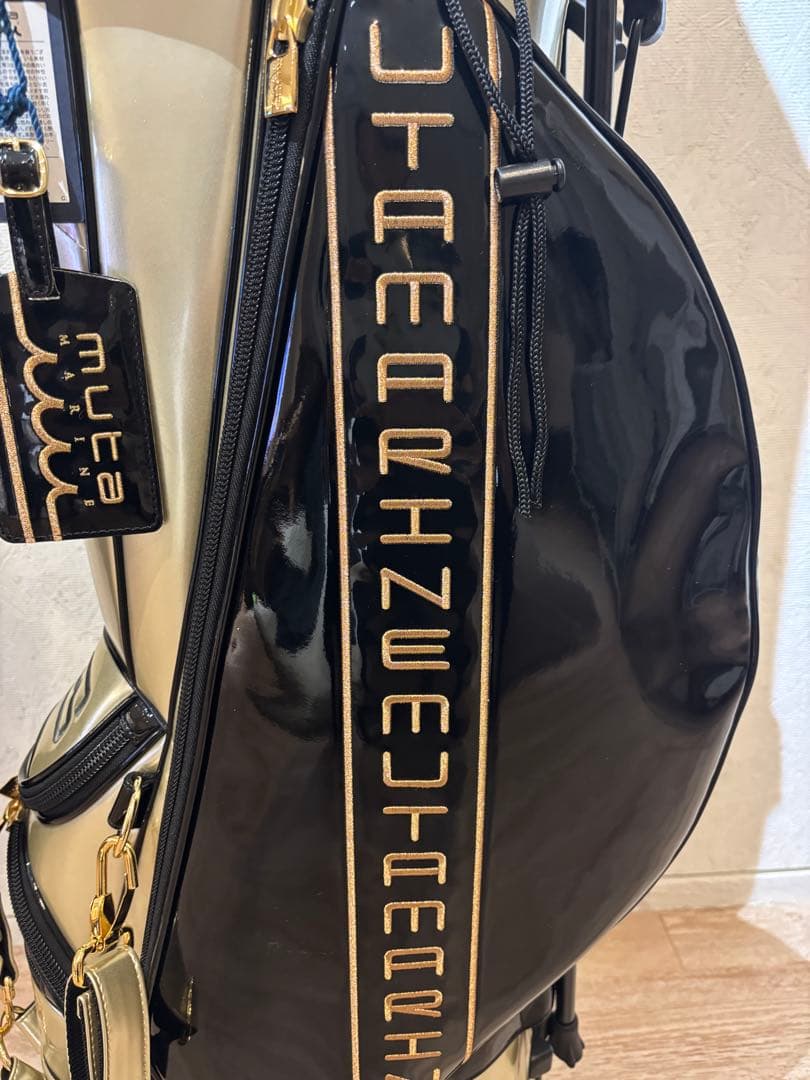 ムータマリン　シャンパンゴールドキャディーバック