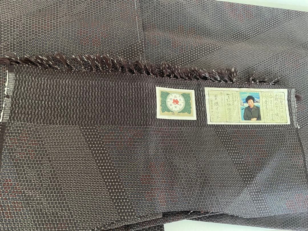 未使用　単衣　本塩沢　やまだ織　証紙有　裄丈69cm　亀甲絣　裄長さん　お召し