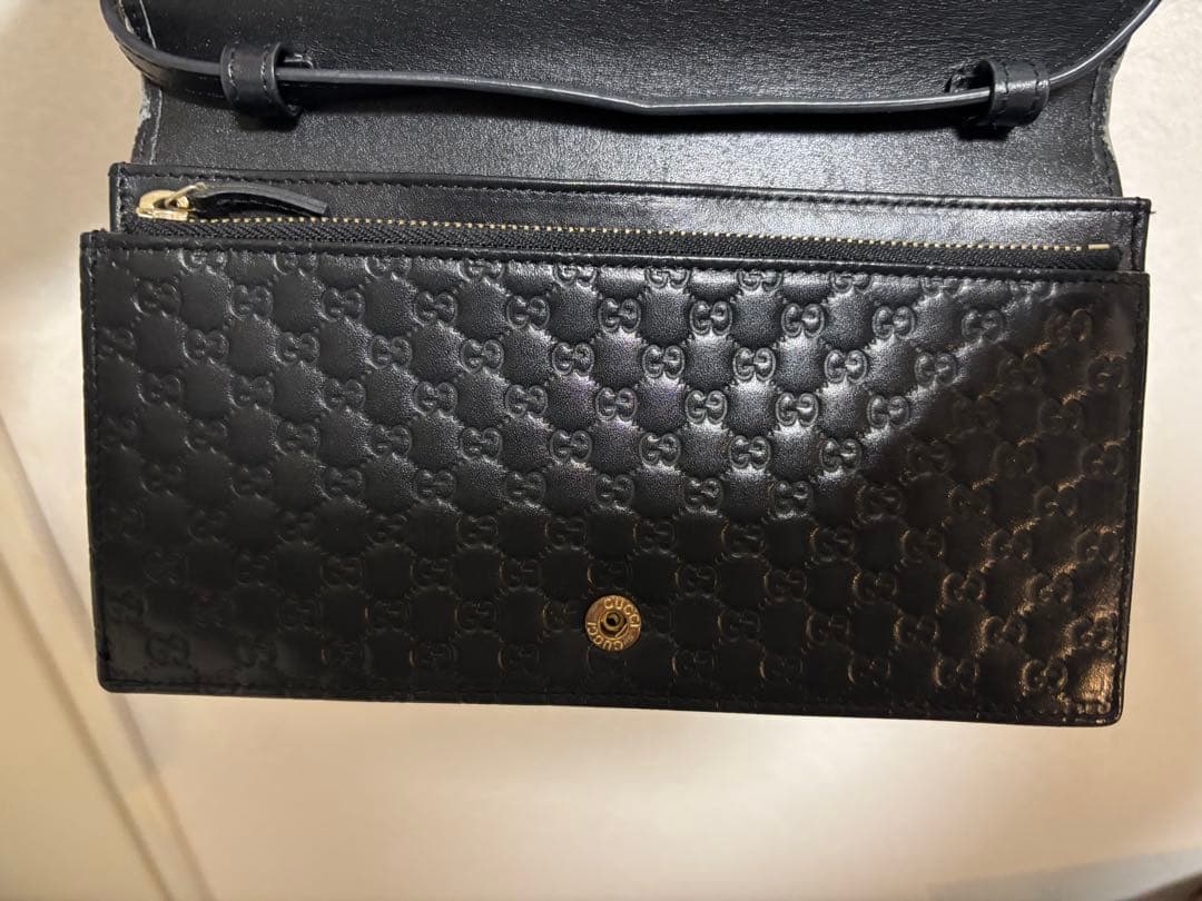 GUCCI ブラック レザー ウォレットバッグ（男女共用）