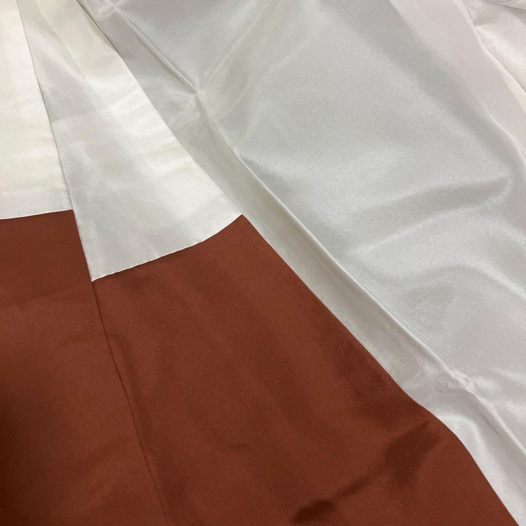 本場結城紬 重要無形文化財 地機 黒地 100亀甲 飛び柄 4色絣 未使用 美品