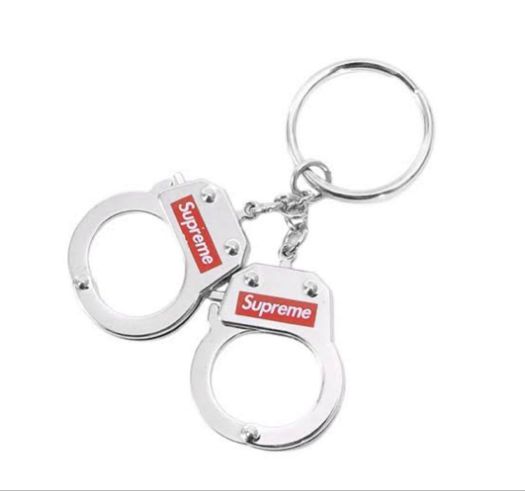 新品未使用半タグ付Supreme Handcuffs キーホルダー&ステッカー