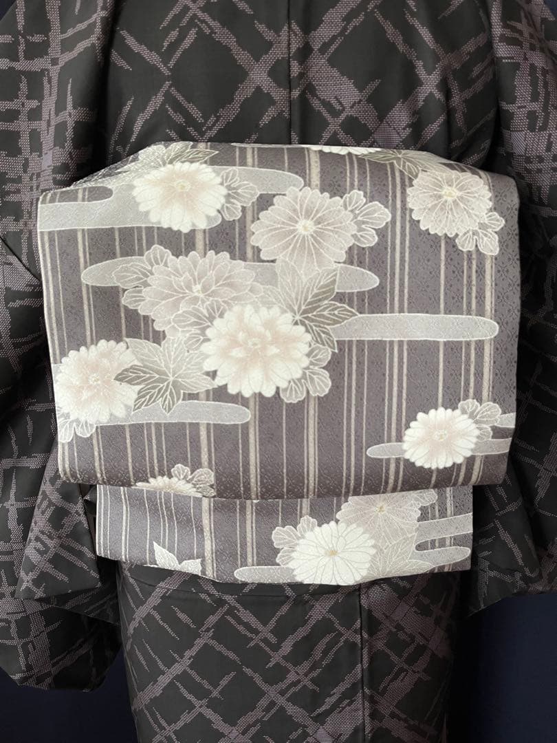 【本場大島紬・名古屋帯セット】　スタイリッシュ　 本泥染め9マルキ　吉祥文