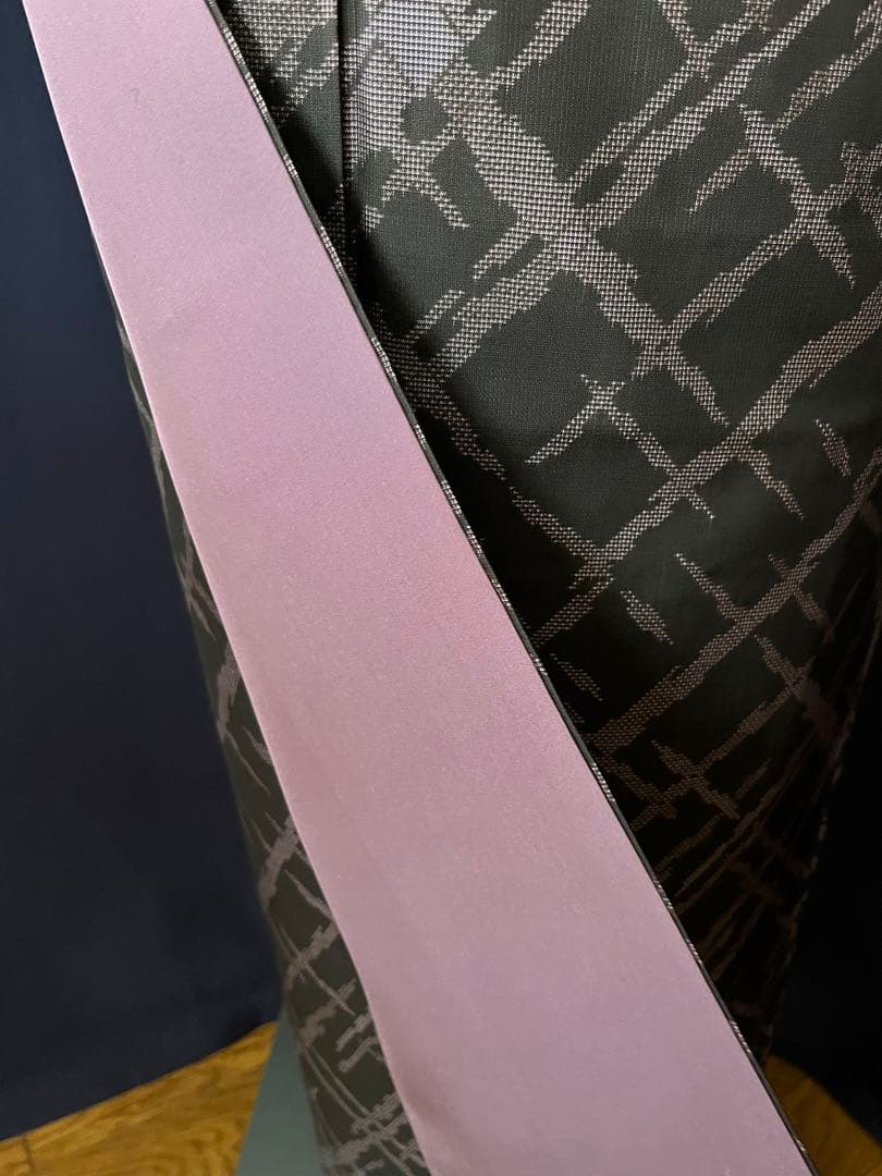 【本場大島紬・名古屋帯セット】　スタイリッシュ　 本泥染め9マルキ　吉祥文