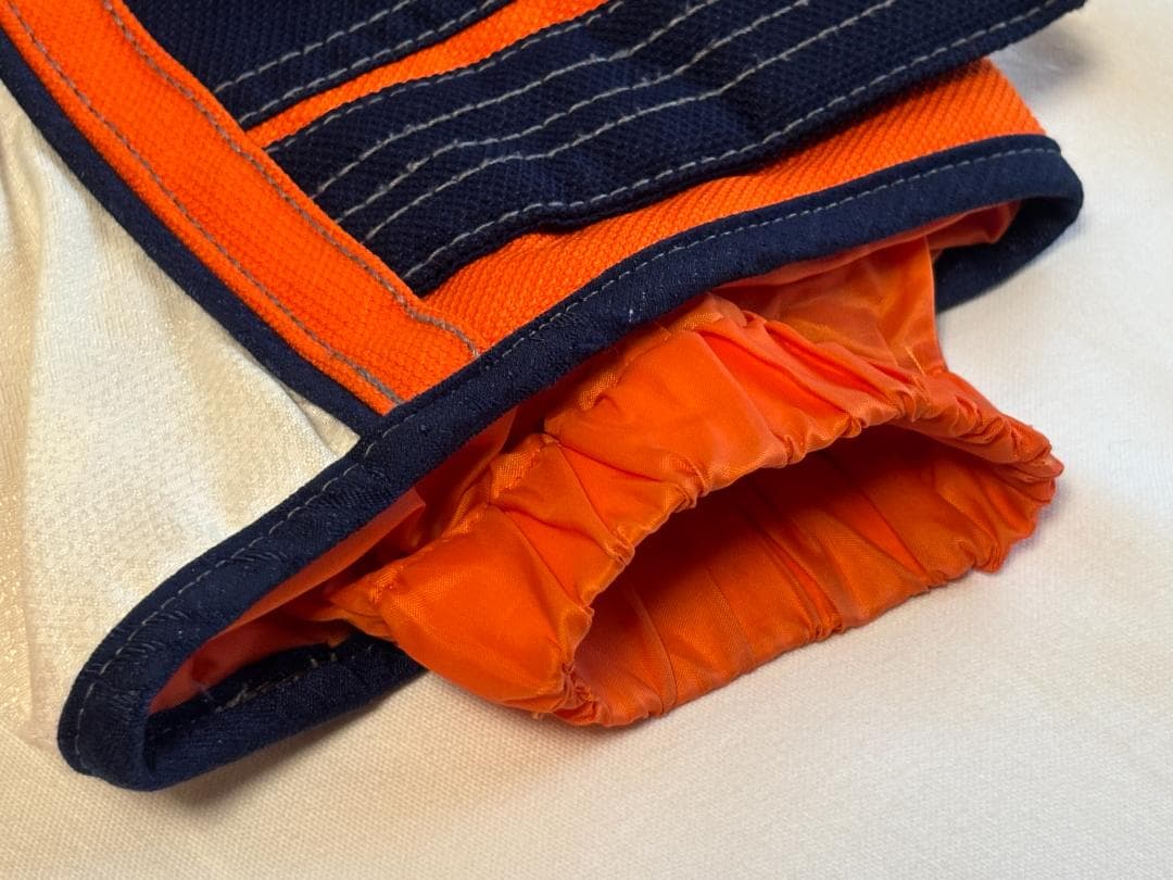 DESCENTEデサント スキースノーボードウェア オレンジ/ネイビー サイズO