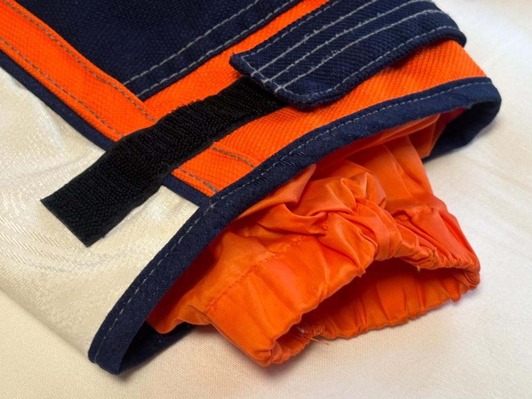 DESCENTEデサント スキースノーボードウェア オレンジ/ネイビー サイズO