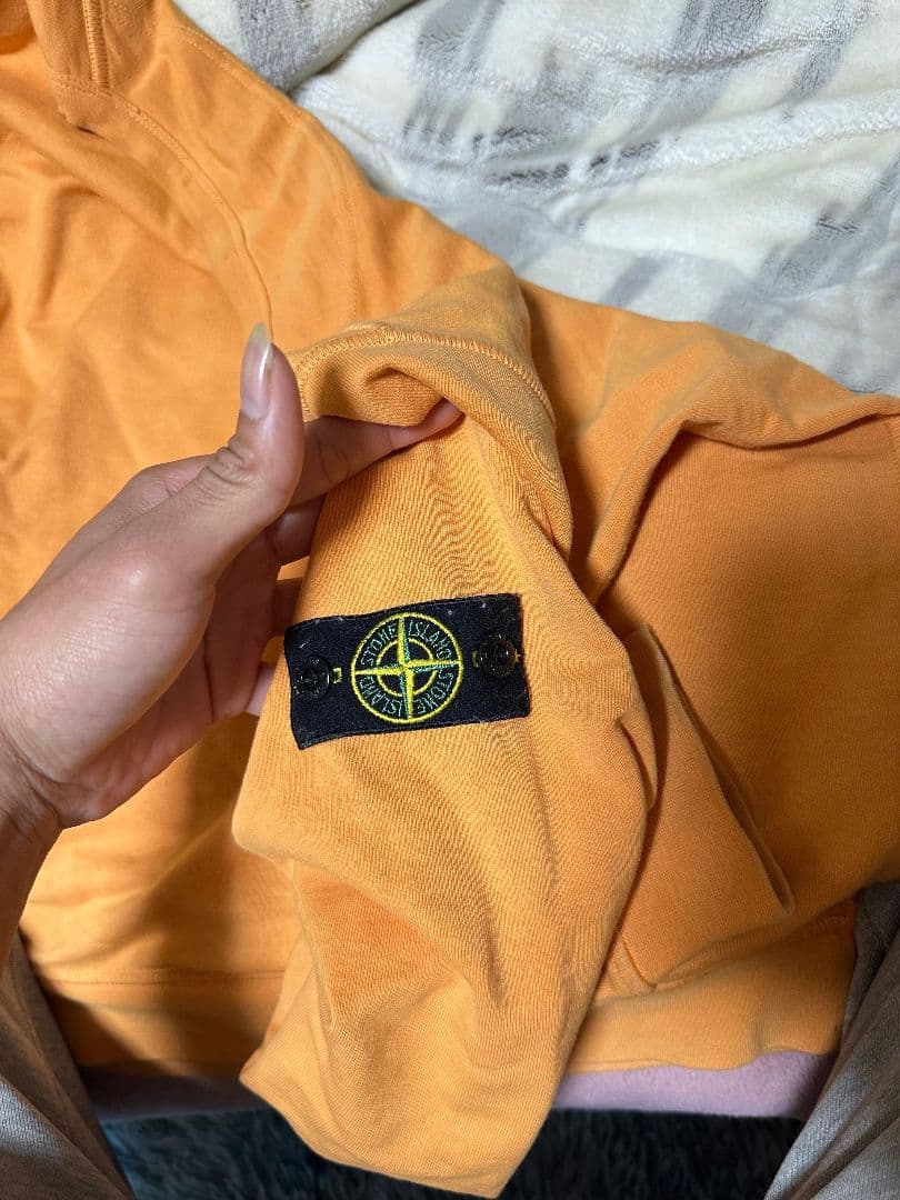 Stone  オレンジ トレーナー