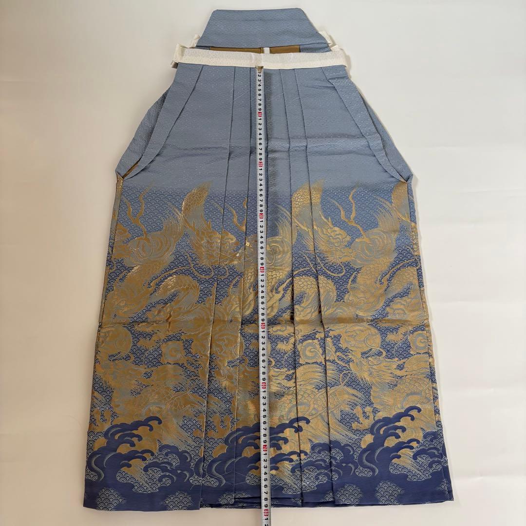 (7-138)馬乗袴　2尺1寸　水色　龍柄　金