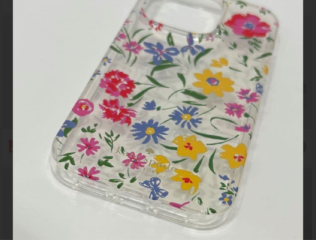 KATE SPADE iPhone14Proスマホリング付属 クリームマルチ1