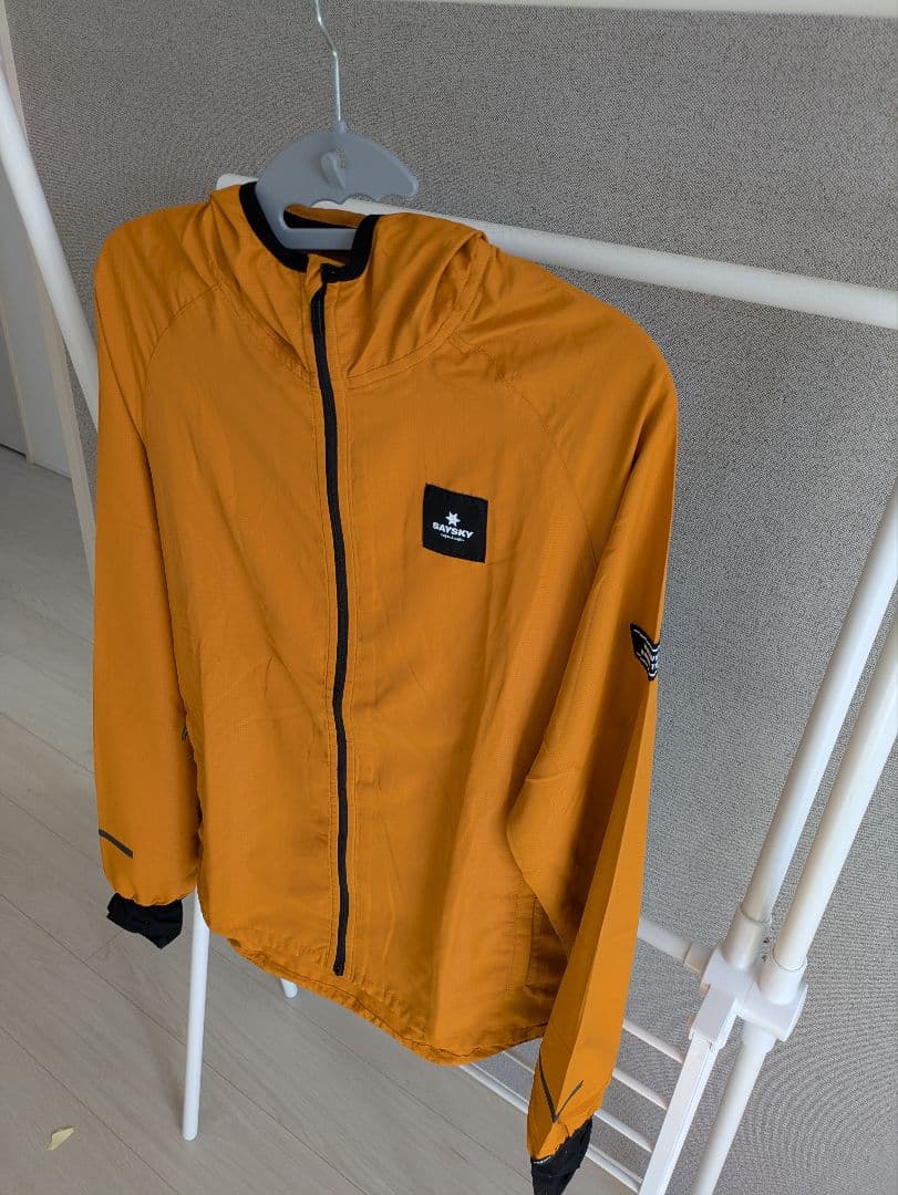 saysky セイスカイ　オレンジ ウインドブレーカー　サイズxs