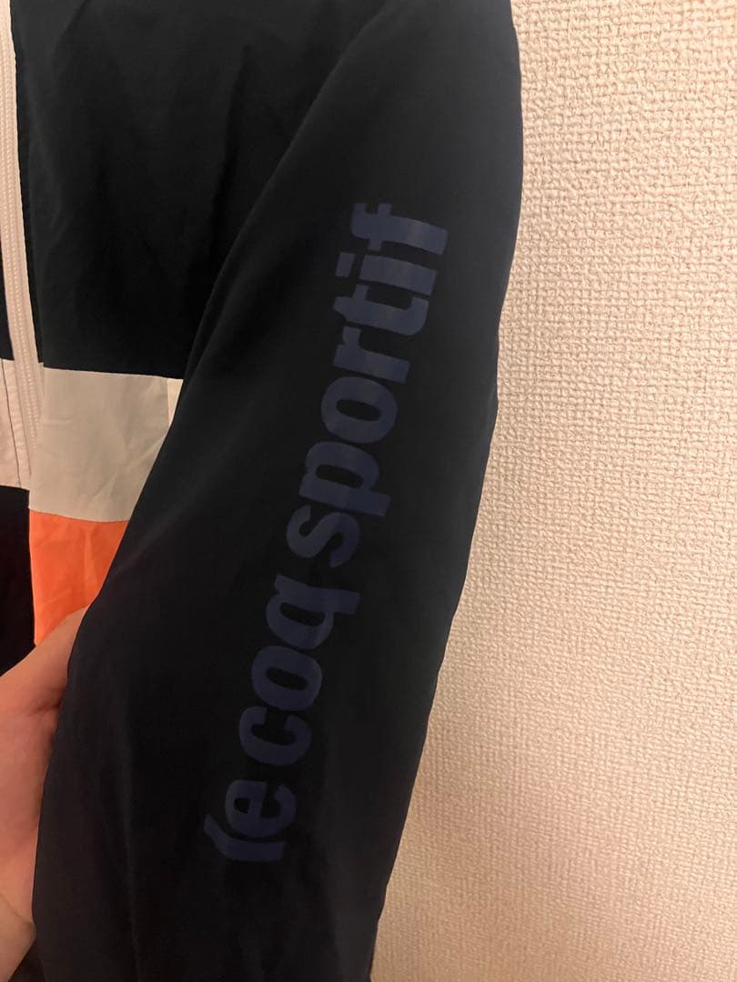le coq sportif ウィンドブレーカー ネイビー