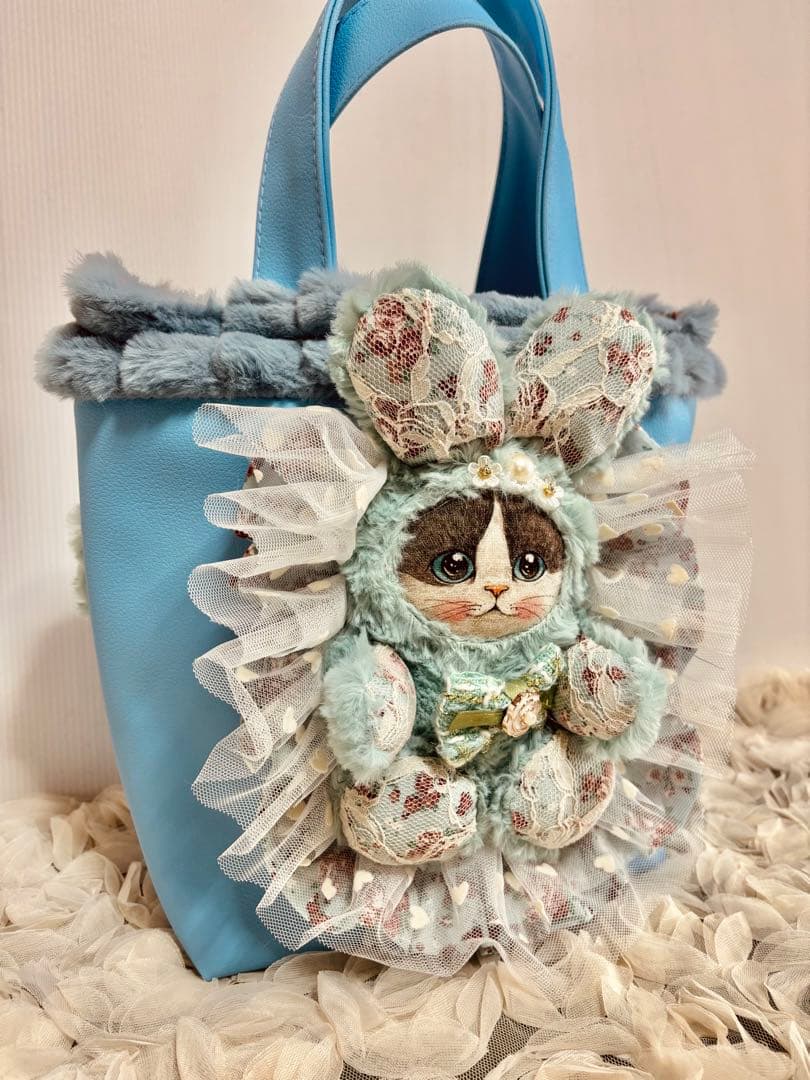 コヤンイサムチョン　フェイクレザーブルーのトートバッグ