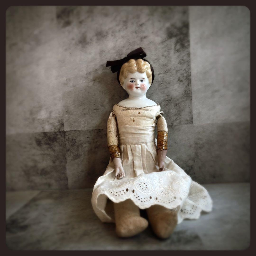 アンティーク ブロンド　チャイナヘッドドール　レザーボディ