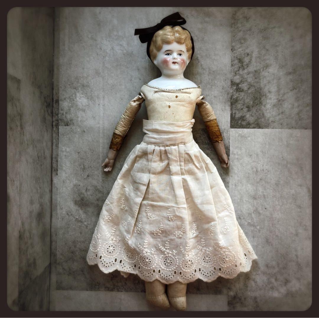 アンティーク ブロンド　チャイナヘッドドール　レザーボディ
