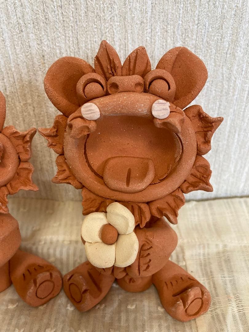 シーサー　御守り　魔除け　厄除け　笑顔　ニコニコ　花シーサー　陶器　やちむん沖縄