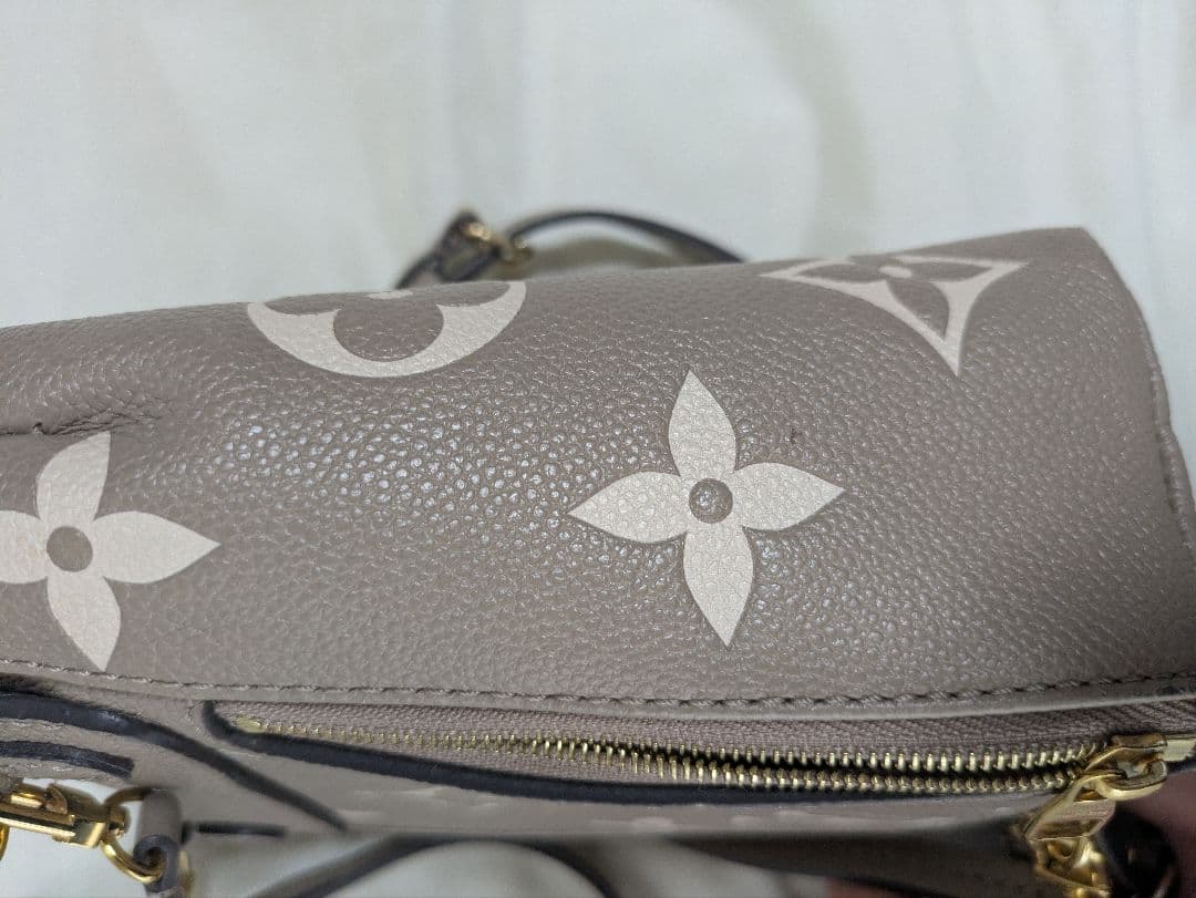 Louis Vuitton タイニーバックパック