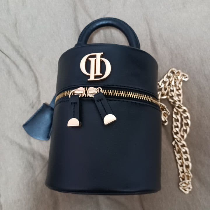 ダーリッチ Dモチーフミニバニティバッグ