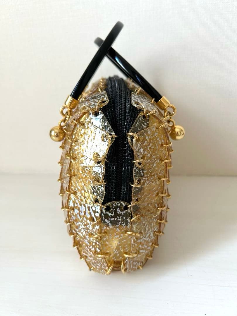 【未使用】ゴールドのハンドバッグ　豚革プレート